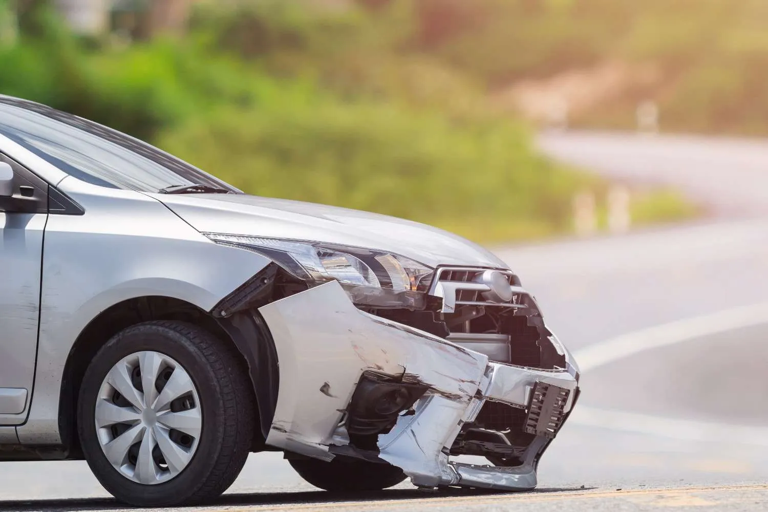 A driver reading through an auto policy document