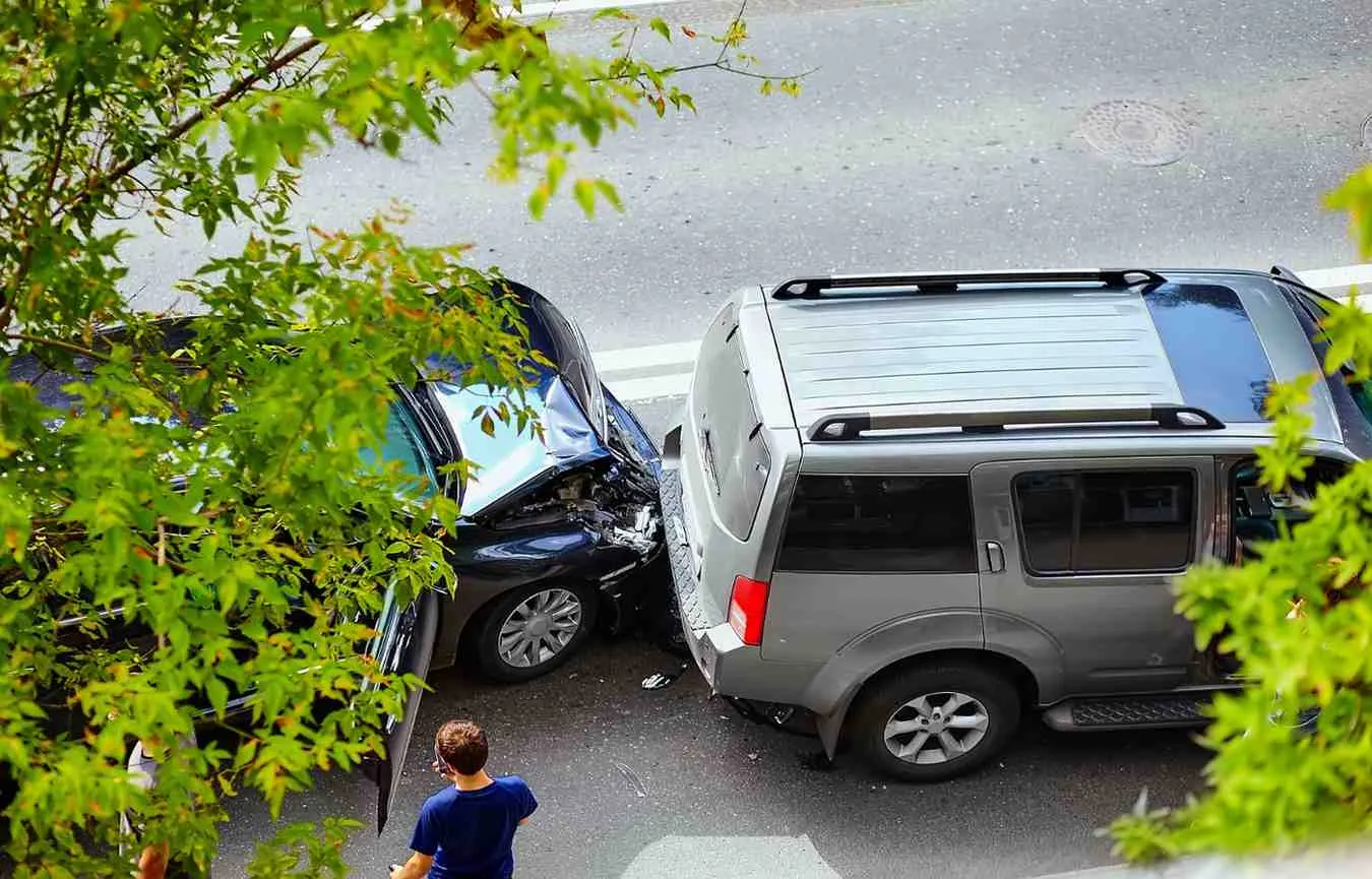 Two cars after a collision at the roadside